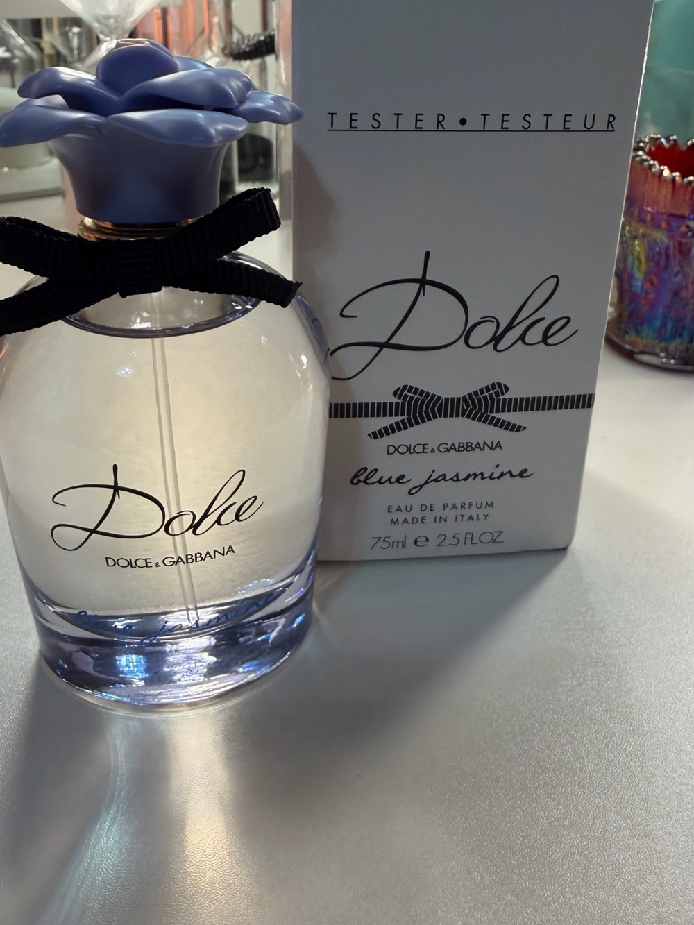Dolce & Gabbana perfume bottle with purple tones